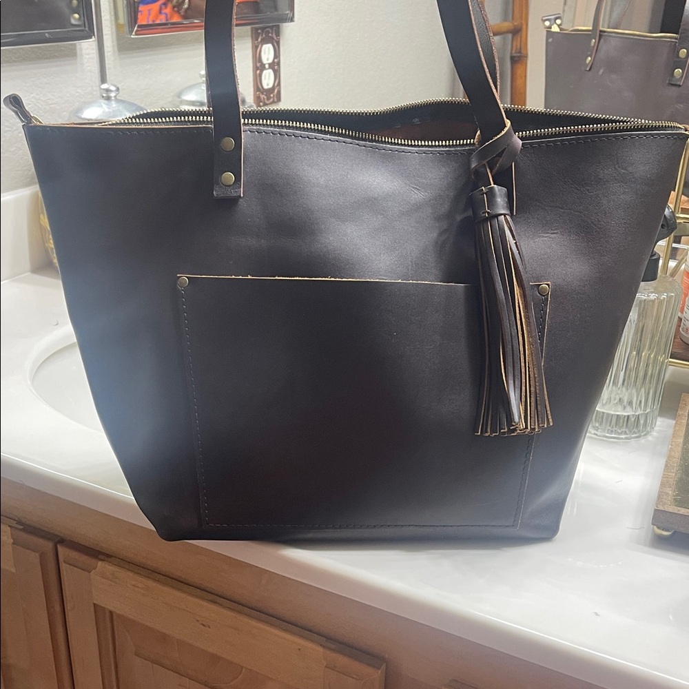 Elegant Black Leather Tote with Tassel